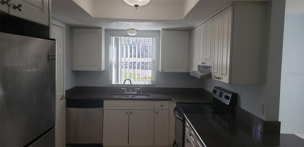 Photo of 9927 Turf Court #5, Orlando, FL 32837 (MLS # S5146505)