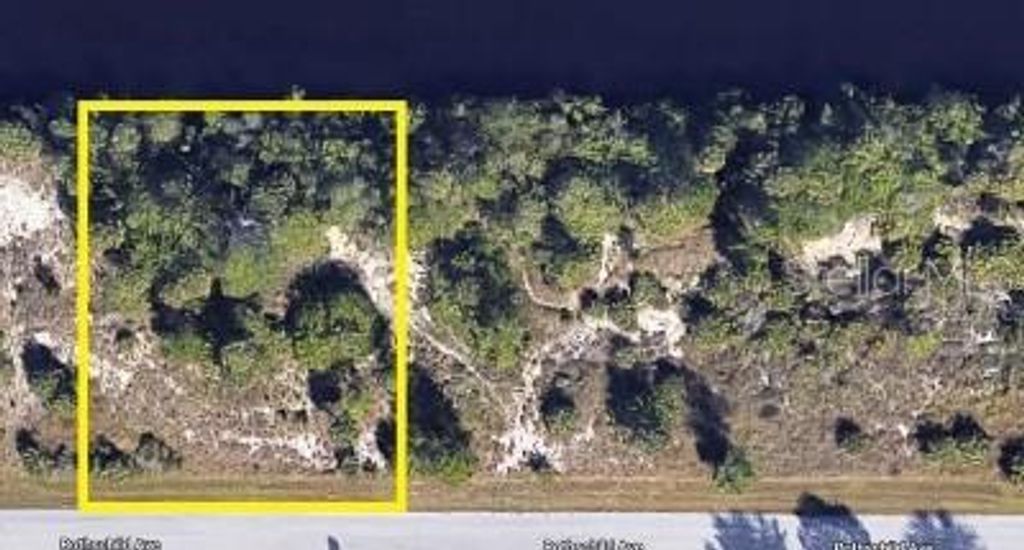 Photo of 14368 Rothschild Ave, Port Charlotte, FL 33953 (MLS # O6326399)