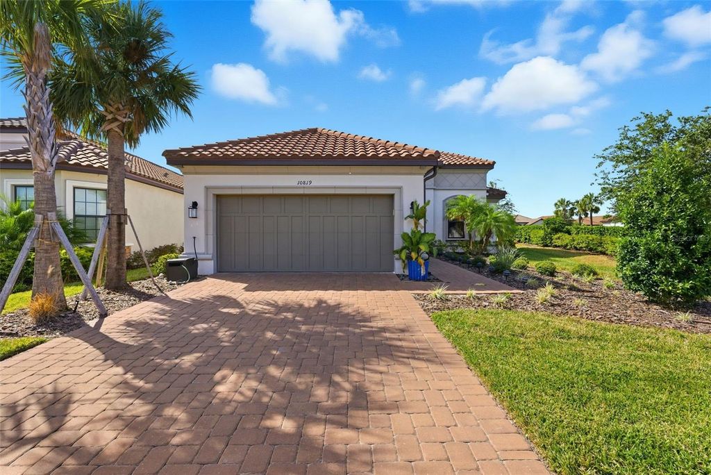 Photo of 10819 Wicker Park Place, Palmetto, FL 34221 (MLS # TB8439612)
