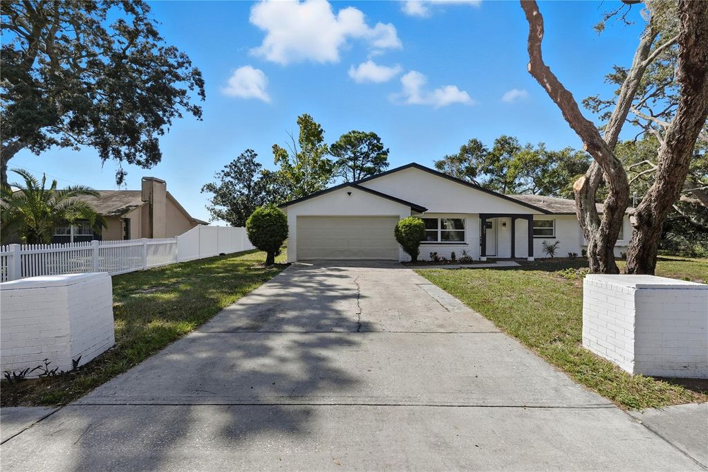 Photo of 577 Waterfall Drive, Spring Hill, FL 34608 (MLS # TB8433351)