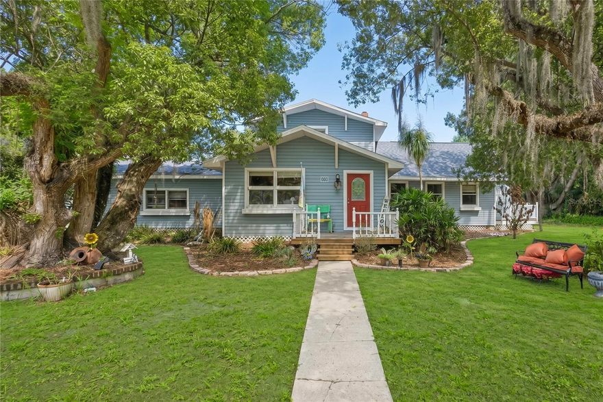 One or more photo(s) has been virtually staged. Welcome to a rare chance to own a piece of history just steps from the heart of Downtown Mount Dora.
Built in 1900 and rich with character, this 4-bedroom home offers 2,725 square feet on an oversized 0.55-acre fenced corner lot, something you simply don't find this close to downtown. Zoned R-2, the property allows for a potential second dwelling (subject to approvals), creating a powerful opportunity for a guest house, income-producing rental, or multi-generational living setup. Inside, timeless charm meets thoughtful updates. You'll find soaring ceilings, refinished original hardwood floors, and spacious living areas designed for both comfort and entertaining, including a large family room, formal living room, and an expansive dining space. The layout offers flexibility with two bedrooms upstairs and two downstairs, each level featuring a full bathroom. The kitchen delivers both function and space with an eat-in area, double pantry, and abundant cabinets.