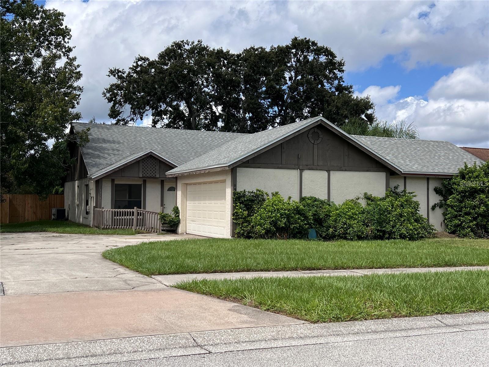 Afforable in East of Orlando, a 2brdm/2bth/detached 2 Car Garage one side of the duplex. Quiet neighborhood, no rear neighbor. Tile in all living areas and newer luxury vinyl plank in both bedrooms. Great floor plan. Updated kitchen and bathroom, newer countertops and wood cabinets. Newer stainless steel appliances. Convenient location, minutes to downtown Orlando, Airport and UCF, Valencia East Campus and Full Sail, short driving distance to beaches. Community Swimming Pool.