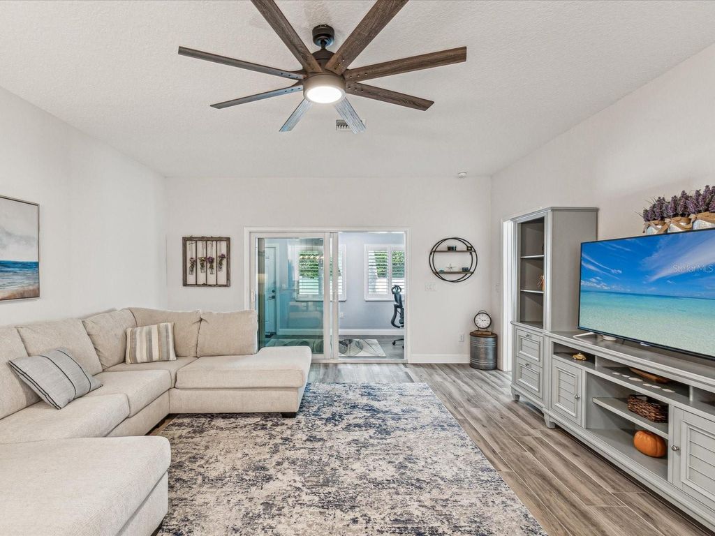 Photo of 1979 Whitney Oaks Boulevard, Clearwater, FL 33760 (MLS # TB8453235)