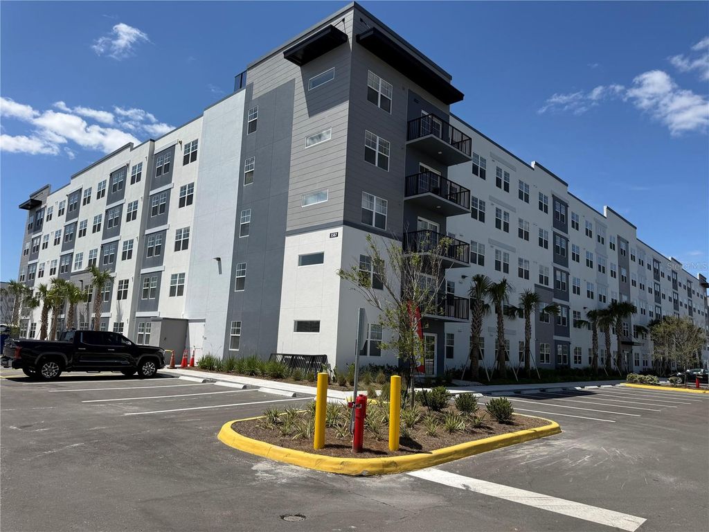 Photo of 5587 Millenia Park Boulevard #424, Orlando, FL 32839 (MLS # S5147632)