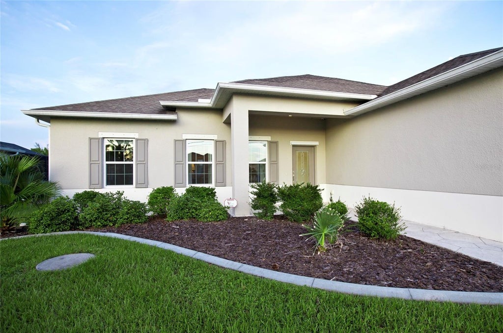 Photo of 8117 Tecumseh Circle, Port Charlotte, FL 33981 (MLS # D6148520)