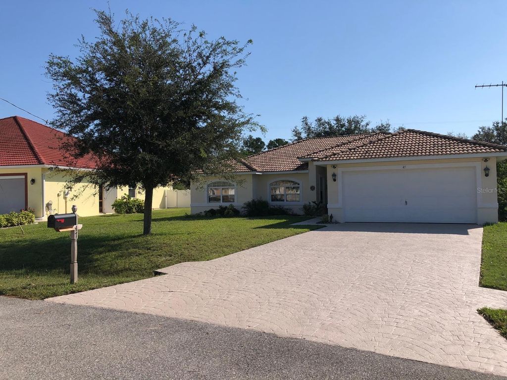 Photo of 47 Fieldstone Lane, Palm Coast, FL 32137 (MLS # FC312775)