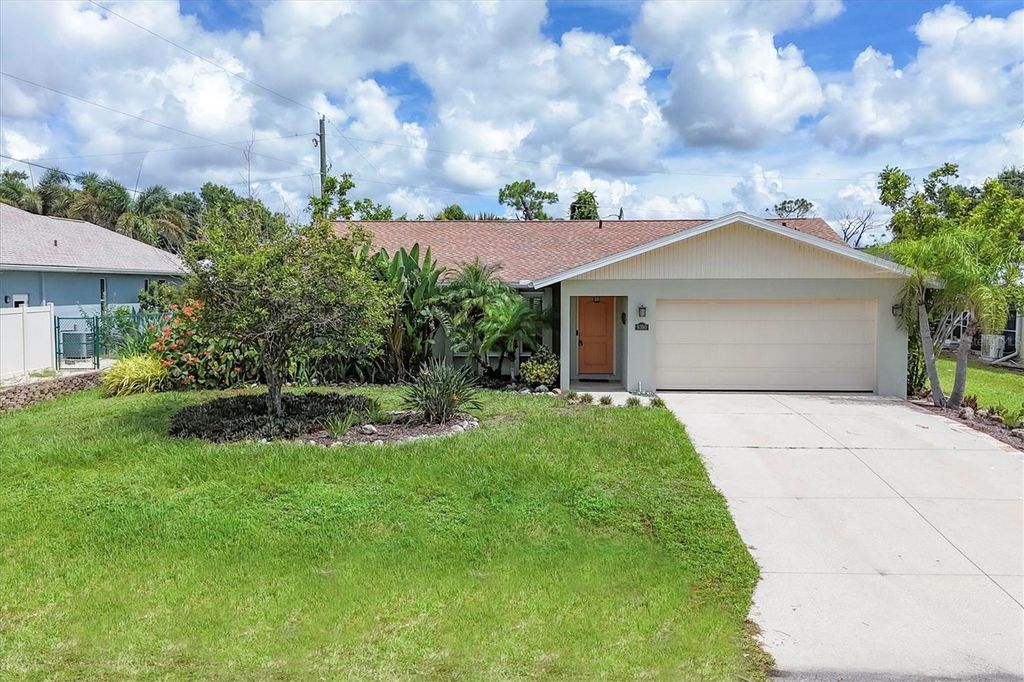 Photo of 9390 Heartwellville Avenue, Englewood, FL 34224 (MLS # N6140060)