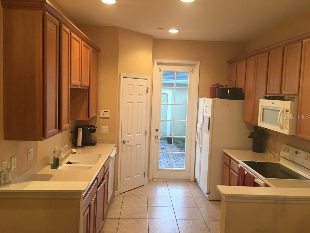 Photo of 9735 Fenrose Terrace, Orlando, FL 32827 (MLS # O6381032)