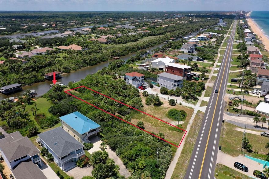 Want to Build a Home in Flagler Beach and have the Ocean to the East and the Intracoastal Waterway to the West? Here is your opportunity to do so WITH a Covered Dock WITH LIFT already in place! There is a Deeded Beach Access across the Street that is included with the property! This Vacant, Mostly Cleared parcel is on FOX CUT Saltwater Canal and has DIRECT ACCESS to the INTRACOASTAL WATERWAY! Take a Beautiful Boat Cruise North to St. Augustine Inlet or South to Ponce Inlet! No Wait to Build or Rush to Build. BUY NOW and BUILD LATER! 

**THE PROPERTY BOUNDARIES SHOWN HERE (In Red in Pictuers) ARE FOR ILLUSTRATIVE PURPOSES ONLY AND MAY NOT REFLECT THE EXACT LEGAL PROPERTY LINES. ALL PROPERTY DIMENSIONS ARE APPROXIMATE AND SHOULD BE INDEPENDENTLY VERIFIED BY A SURVEYOR.**