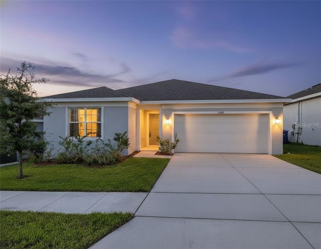 Photo of 1140 Sugarwood Street, Davenport, FL 33837 (MLS # O6364854)
