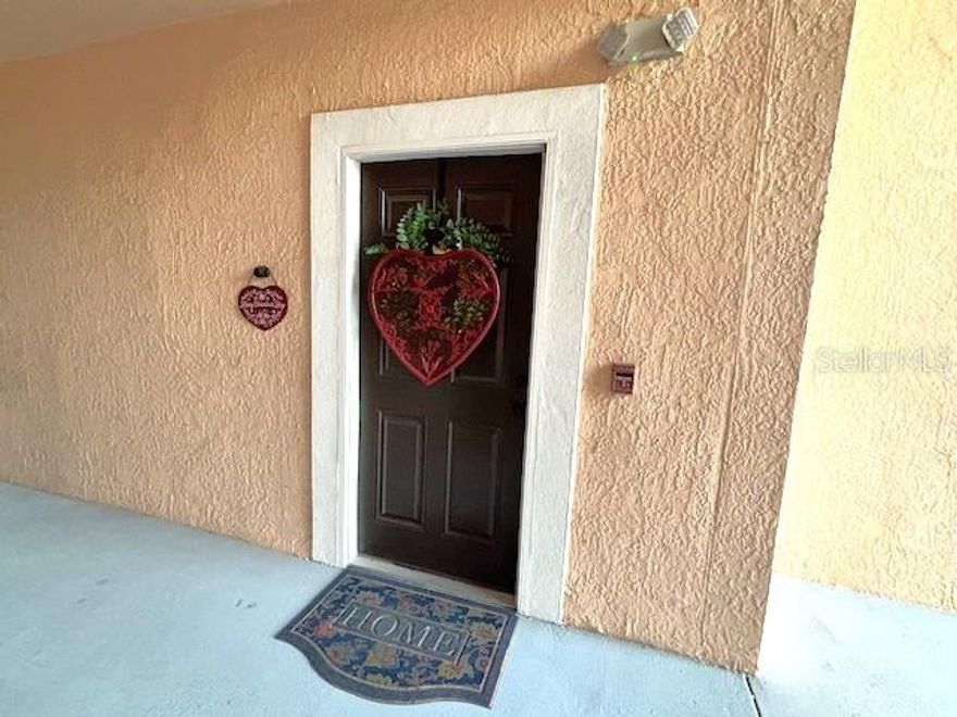 Own your piece of paradise! This updated first-floor unit features a deeded carport and no stairs for easy access. Light and bright one-bedroom condo includes an ensuite bathroom, two spacious bedroom closets, an open interior with high ceilings, a large family room, and a kitchen equipped with stainless steel appliances. Recent upgrades include custom shades and screens on the lanai, custom bedroom blinds, new ceiling fans, and tile flooring throughout. The home also features custom wall trim, crown molding, and an interior laundry closet with a full-size washer and dryer included. You can enjoy peaceful lake views from every room or relax on the screened lanai to watch the local Florida wildlife. The building itself has undergone extensive updates, including new exterior stucco and paint, a new roof, and new hurricane-impact windows and sliders. Located in the gated, well-managed Bella Villino community surrounded by mature tropical foliage. Offering resort-style amenities including a heated pool and spa, clubhouse with business center and catering kitchen, tennis/pickleball courts and fitness center. This Palmer Ranch, Sarasota location is close to Siesta Key Beach, Nokomis Beach, The Legacy Trail, Costco, and Lowe's. You will have easy access to downtown Sarasota, St. Armand's Circle, and Longboat Key to the north, as well as Osprey, Nokomis, and Venice to the south. The property is also near the upcoming redevelopment of Sarasota Square, which is expected to feature a AMC Theater, Whole Foods, HomeSense, Trader Joe's, and more