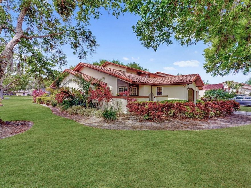 Completely updated and upgraded Villa that will knock your socks off. Once you become a resident.....You will have access the private "residents only" gate into GRENELEFE off of Kokomo road. That street is called Coventry Dr. At the end of that road you'll slide right into CLUB ESTATES onto Coventry Lane. As you arrive at 112 Coventry Ln, you will find a completely renovated END unit Villa adorned with new porcelain floors throughout (that look like engineered hardwood, and are so easy to clean) which includes both bedrooms and halls, there is no carpet in this home!!  The kitchen is updated and complete with beautiful SS appliances, new cabinets, a built in pantry closet, under cabinet lighting, a full kitchen backsplash and top of the line quartz countertops with a waterfall edge to the floor, VERY tastefully done! Just past the living room area and through the triple sliders, there is an oversized rear patio screened porch large enough for a couple of patio tables, chairs and/or lounge chairs to gaze over the peaceful rear area of this home. This rear area that once was a golf hole is now slated to be a walking trail with a fountian plus a pond (in the future). There is also a private golf cart garage in the back for your use but can also be used for storage. The Primary bedroom is ample in size, and has an en-suite bathroom with a very large shower and double sinks area. Second bedroom and additional full bathroom is beyond the kitchen area. As far as the COMMUNITY AMENITIES go:  there is a screened in community pool plus a in ground hot tub just walking distance from your Villa. There is a large screened in patio area with tables and chairs for your use. There is a clubhouse with a fully functioning kitchen also for your use, AND .... showers with a  locker room, a relaxing sauna, plus an exercise area....ALL for your use !  Make that appointment...see the beauty this Villa has...Fall in LOVE !!  Newer Air Conditioner, Barrell tile roof installed in 2006, Almost completely furnished. What's not to love ???