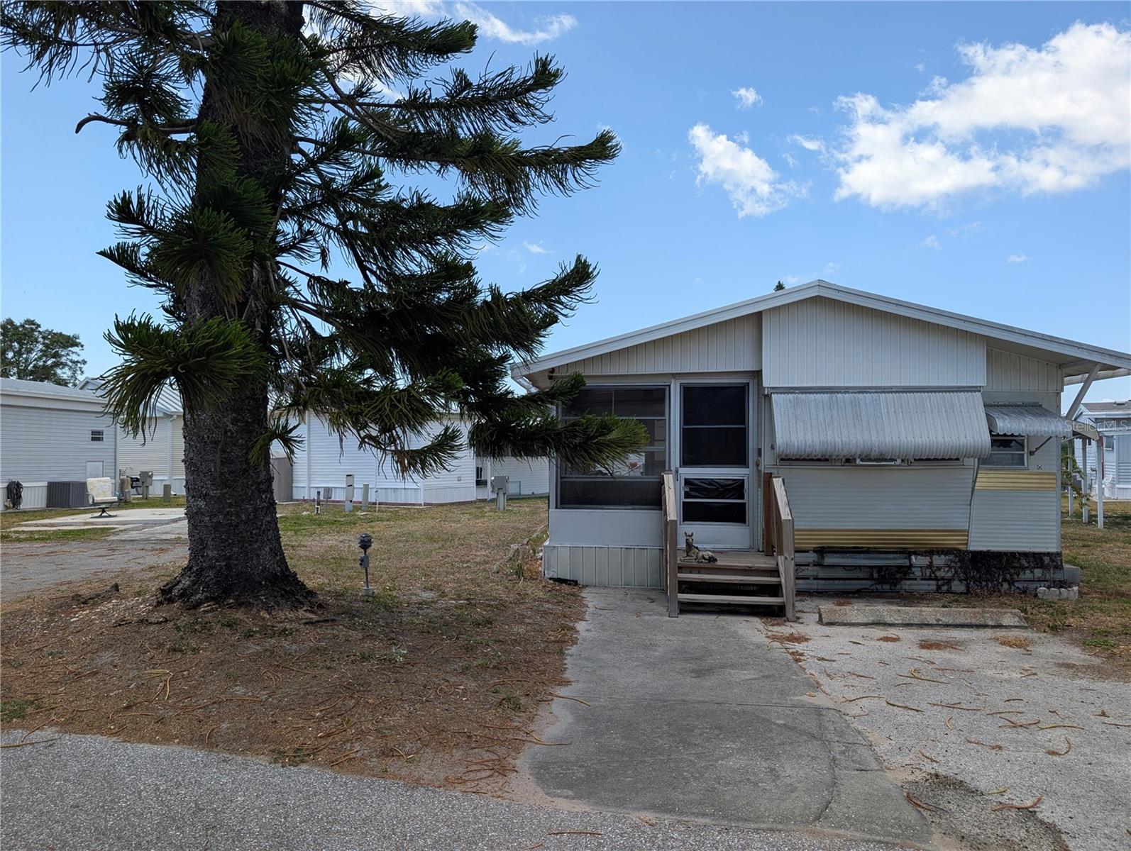 This sale includes two lots right next to each other. One lot is vacant. The other lot has a mobile home on it that is a fixer upper or you have the option of tearing it down and having two RV lots. This community allows for immediate seasonal rentals, allowing you to rent one or both of the lots out right away. This 55+ community features a heated pool, large clubhouse and shuffleboard courts. Not to mention loads of wintertime activities. Owners must have a minimum credit score of 750 to purchase within this park.