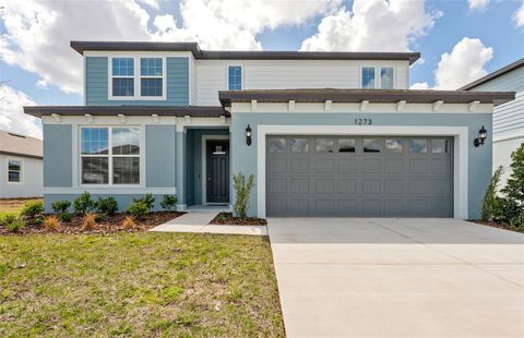 Photo of 1273 Lakeridge Way, Lake Alfred, FL 33850 (MLS # TB8462004)