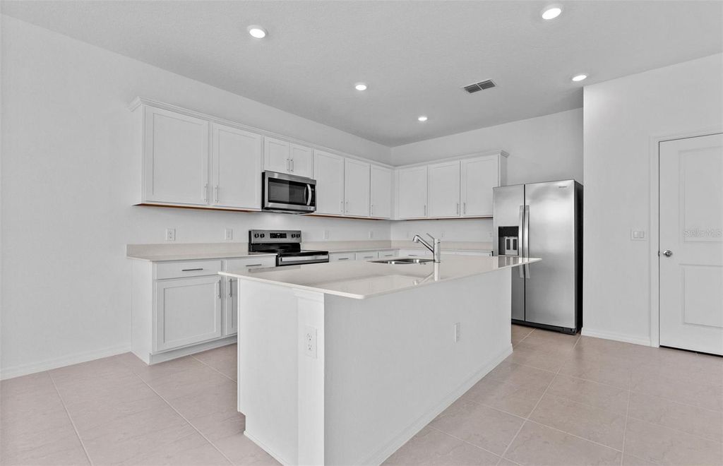 Photo of 1273 Lakeridge Way, Lake Alfred, FL 33850 (MLS # TB8462004)