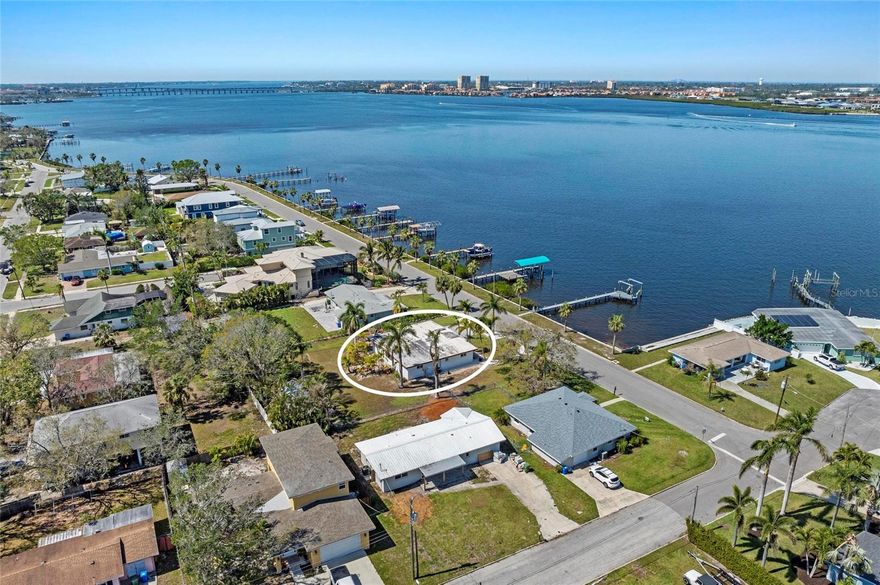 Experience riverfront living along one of Bradenton’s most cherished waterfront neighborhoods, where Old Florida charm meets wide-open freedom and no HOA rules stand between you and the lifestyle you want. Set on a rare double lot, this property offers direct access to the Manatee River, giving boaters an easy route to Tampa Bay and the Gulf with the space at home to store every toy imaginable: RVs, trailers, jet skis, boats, work trucks, and more. The setting feels private and unhurried, framed by mature trees and the peaceful rhythm of the river, yet ideally located within minutes of downtown Bradenton, restaurants along the riverfront, marinas, parks, and the cultural and coastal experiences that define the Sarasota–Bradenton area. The existing home is welcoming, functional, and move-in ready, but what truly sets this property apart is the canvas it offers with room to expand, re-imagine, or build the riverfront retreat you’ve always pictured. Morning sunrises wash across the backyard, afternoons invite you onto the water, and evenings settle into breezy, golden light you can only find along the sparkling water. Riverside Drive has long been known for its character and the unmistakable feeling of a neighborhood rooted in authenticity rather than restrictions. Whether you’re looking for a place to redesign from the ground up, keep as a peaceful waterfront getaway, or create a compound surrounded by open space, privacy, and direct water access, this property delivers a rare combination of location, flexibility, and genuine Florida lifestyle. Here, the water is steps from your front door, the lot is expansive and truly yours to shape, and the opportunities are as open as the lifestyle you’ve been searching for. Minutes to the downtown Bradenton Riverwalk and a straight 11 mile drive to the world-famous beaches of Anna Maria Island, giving you effortless access to boating, dining, and the Gulf coast lifestyle. This is not just a property, it’s a chance to claim a piece of Old Florida waterfront, design a life that moves at your pace, and anchor yourself in a setting that feels both timeless and full of possibility.