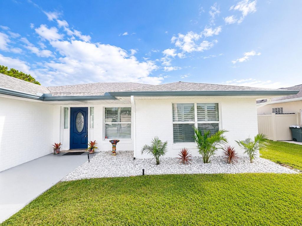 Photo of 223 NE Golf Club Drive, New Smyrna Beach, FL 32168 (MLS # NS1088588)