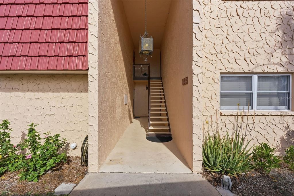 Photo of 212 Cedarwood Circle #212, Seminole, FL 33777 (MLS # TB8495131)