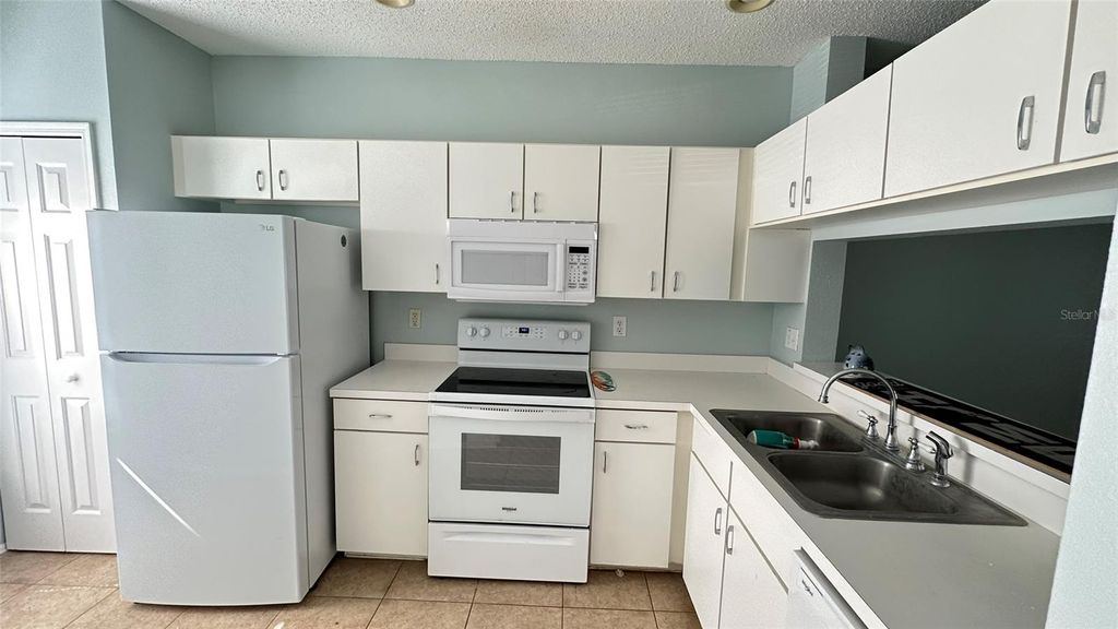 Photo of 1400 Costa Mesa Drive, Wesley Chapel, FL 33543 (MLS # TB8384946)