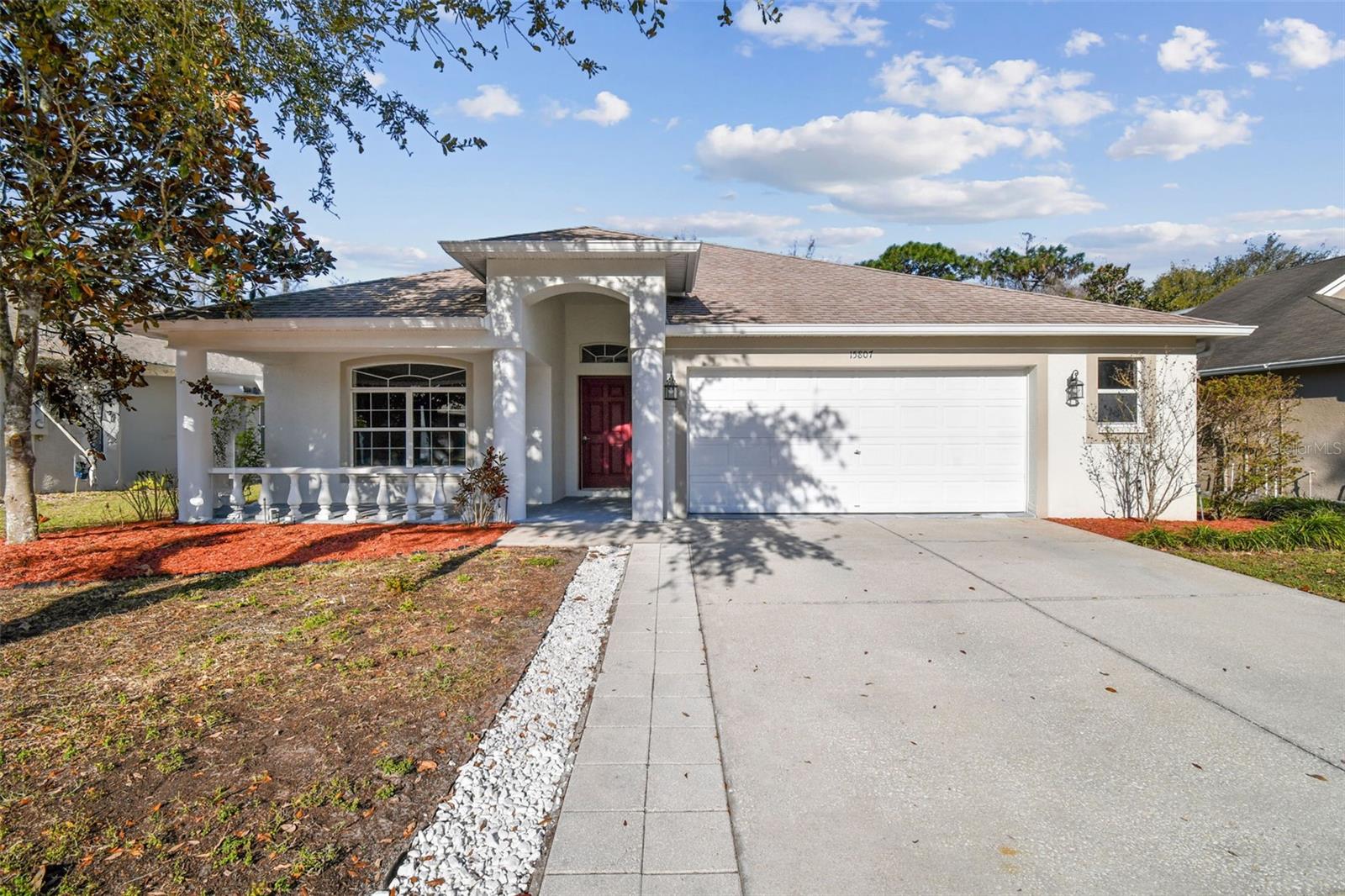 MUST SEE!!! This 4 bedroom, 2 bath home with fenced yard on preserve. Entering through the front door there is a large open area for formal living and dining to the left. Past the formal area is a nicely laid out kitchen to the right with eat-in dining and a pantry. Split plan with owners suite and master bath on right. Two bedrooms on the left side of the home with bathroom in between. Fourth bedroom separate and fenced backyard. Right off the kitchen is the laundry room and access to the two car PLUS garage. That's right...extra space in the garage! The kitchen has a large opening to the living room and view to the screened lanai and preserve out back. The owners suite is on one side of the house with a large bathroom with double sinks and separate shower/tub and a large walk-in closet. Three other bedrooms are all nice size on the opposite side of the home. Home backs up to the woods and is very quiet with privacy fences on either side and chain link in the back. Community pool/playground and much more. This home shows very well and won't last long at this price. Close to the Suncoast Parkway and access to Tampa area.