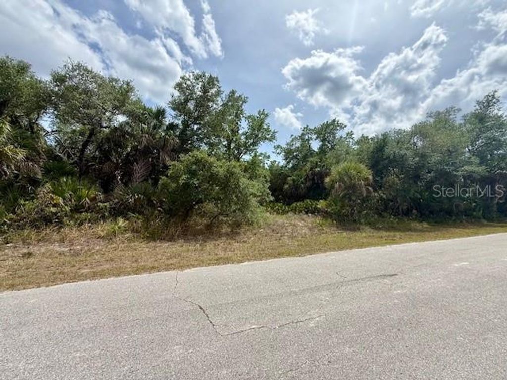 Photo of 19135 Ruskin Avenue, Port Charlotte, FL 33954 (MLS # C7525774)