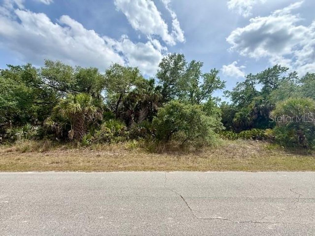 Photo of 19135 Ruskin Avenue, Port Charlotte, FL 33954 (MLS # C7525774)