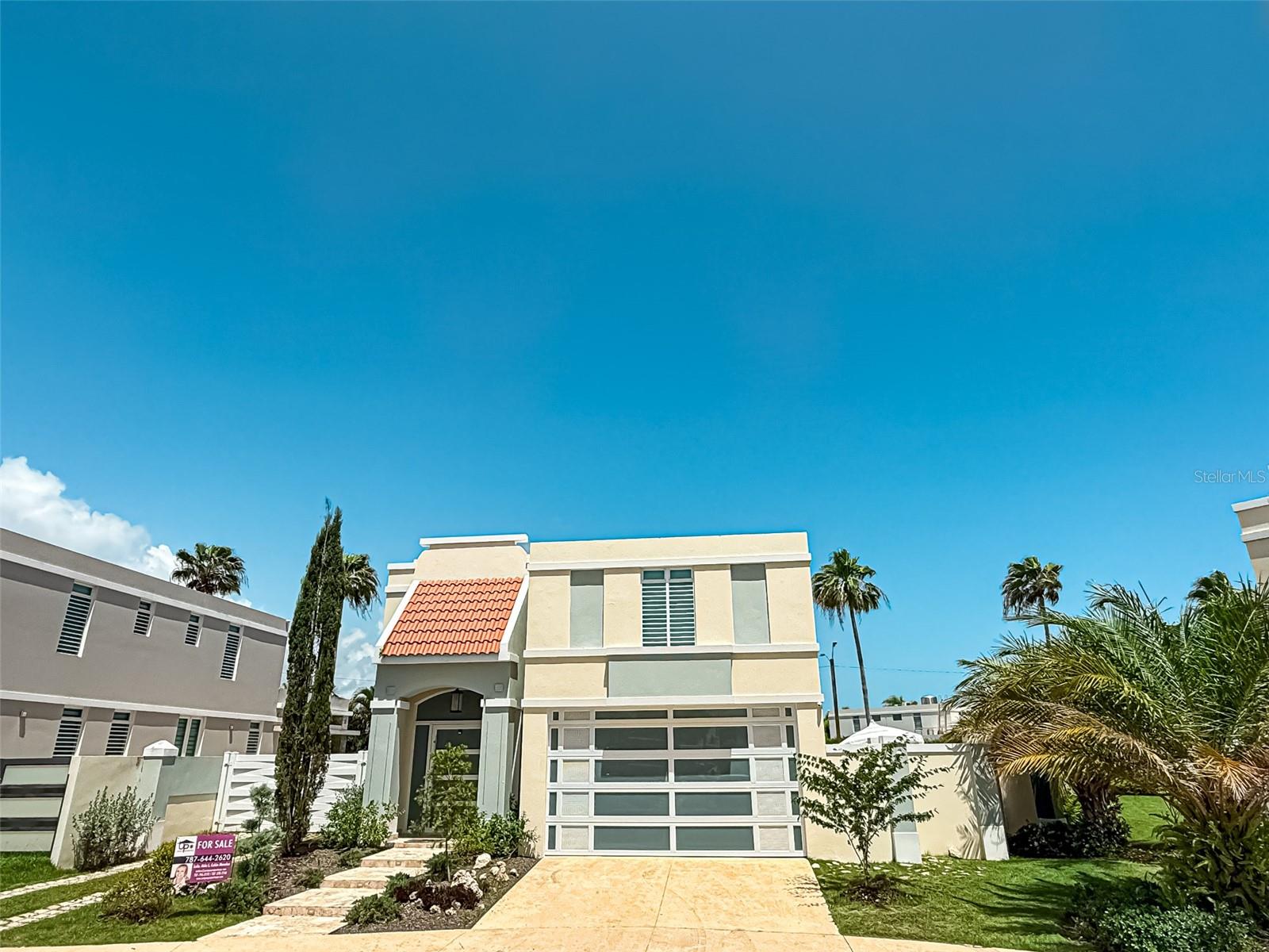 BEST LIFESTYLE IS CALLING YOU in DORADO PR! READY TO MOVE IN!Turn-Key, Upscale, Modern finishes,...Nurtured with plenty of natural light, Beautiful, tastefully equipped, modernly customized featuring two ( 2) stories of living area. Majestic Foyer with high ceiling and unique lamp! The whole house is harmoniously remodeled. The four bedrooms keeps the same upscale style, with floating furnishing TV centers,Air conditioners. For Sale at Paseo Los Corales II ! This unique modern property has it all! - 4 Bedrooms - 2 Full Bathrooms - 2 Half Bathrooms - Pool - Power Generator - Electric Storm Shutters - Walking Distance to the Facilities - Custom Kitchen - Custom Fascias` - Two cars Garage take a look! Don't miss this Unique opportunity!
OUTDOORS FEATURES: BEAUTIFUL LANDSCAPING, TWO ACCESS GATES TO THE HOUSE,
_POWER GENERATOR(electricity BACK UP SYSTEM)
_SECURITY WINDOWS & DOORS
_HURRICANE SHUTTERS ELECTRIC OPERATED
_SECURITY SYSTEM
- PRIVATE SWIMING POOL
_ONE HALF BATHROOM
_STORAGE
_COVERED TERRACE
_BEAUTIFULLY DESIGNED SWIMMING POOL
_ALL FENCED WITH BAR AREA
_MODERN GARAGE & MAIN ENTRANCE DOORS
INDOORS FEATURES
- MODERN CEILING LAMPS, SCONCES
-QUARTZ COUNTERTOPS
-STAINLESS STEEL APPLIANCES,
-MODERN FASCIAS WITH DOWN LIGHTS
-CURTAINS
-GLASS & STAINLESS STEEL RAILS IN THE STAIRS
- Custom Wall Textures
-WALK IN CLOSET WITH ORGANIZERS
-Led Channels embedded in the ceilings
COMMUNITY AMENITIES: Paseo Los Corales 2 is very well known for its "modern design homes!" It is a highly Secure area, featuring two "Security access check
points gates with 24/7 Security personnel . Amenities aren't missed; including a GYM, SWIMMING POOL, GAZEBO, RESTROOMS, TENNIS COURTS, BASKETBALL COURTS, and playgrounds... Location is unbeatable! Close to the Dorado Beach Resort amenities,Pristine waters Beaches, Golf Courses, Shopping malls, 2 Bilingual Schools,Banks, The Dorado Del Mar Golf Club (Bowling Alley, 4 restaurants, Beach, Casino, The Embassy Suites amenities, Driving Range, Golf shop and more!