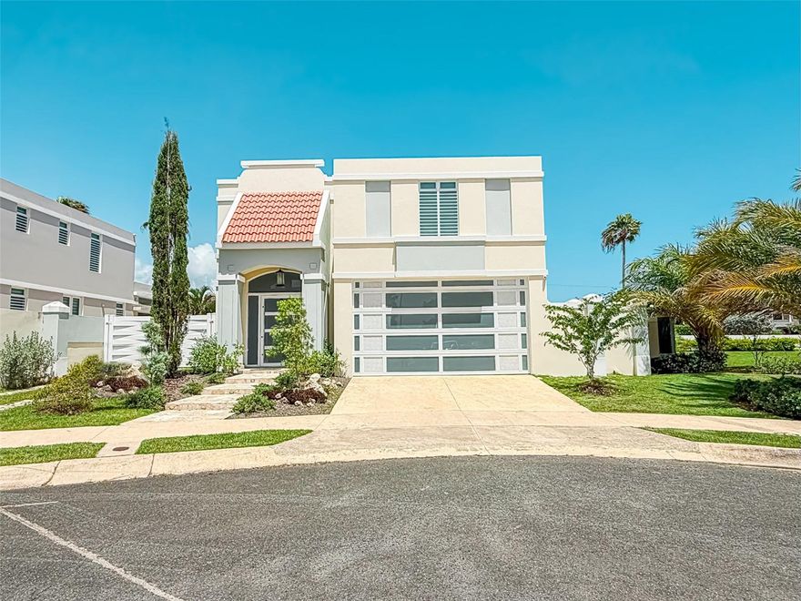 BEST LIFESTYLE IS CALLING YOU in DORADO PR! READY TO MOVE IN!Turn-Key, Upscale, Modern finishes,...Nurtured with plenty of natural light, Beautiful, tastefully equipped, modernly customized featuring two ( 2) stories of living area. Majestic Foyer with high ceiling and unique lamp! The whole house is harmoniously remodeled. The four bedrooms keeps the same upscale style, with  floating furnishing TV centers,Air conditioners.   For Sale at Paseo Los Corales II ! This unique modern property has it all! - 4 Bedrooms - 2 Full Bathrooms - 2 Half Bathrooms - Pool - Power Generator - Electric Storm Shutters - Walking Distance to the Facilities - Custom Kitchen - Custom Fascias` - Two cars Garage take a look! Don't miss this Unique opportunity!
OUTDOORS FEATURES: BEAUTIFUL LANDSCAPING, TWO ACCESS GATES TO THE HOUSE,
_POWER GENERATOR(electricity BACK UP SYSTEM)
_SECURITY WINDOWS & DOORS
_HURRICANE SHUTTERS ELECTRIC OPERATED
_SECURITY SYSTEM
- PRIVATE SWIMING POOL
_ONE HALF BATHROOM
_STORAGE
_COVERED TERRACE
_BEAUTIFULLY DESIGNED SWIMMING POOL
_ALL FENCED WITH BAR AREA
_MODERN GARAGE & MAIN ENTRANCE DOORS

INDOORS FEATURES
- MODERN CEILING LAMPS, SCONCES
-QUARTZ COUNTERTOPS
-STAINLESS STEEL APPLIANCES,
-MODERN FASCIAS WITH DOWN LIGHTS
-CURTAINS
-GLASS & STAINLESS STEEL RAILS IN THE STAIRS
- Custom Wall Textures
-WALK IN CLOSET WITH ORGANIZERS
-Led Channels embedded in the ceilings

COMMUNITY AMENITIES: Paseo Los Corales 2 is very well known for its "modern design homes!" It is a highly Secure area, featuring two "Security access check
 points gates with 24/7 Security personnel . Amenities aren't missed; including a  GYM, SWIMMING POOL, GAZEBO, RESTROOMS, TENNIS COURTS, BASKETBALL COURTS, and playgrounds... Location is unbeatable! Close to the Dorado Beach Resort amenities,Pristine waters Beaches, Golf Courses,  Shopping malls, 2 Bilingual Schools,Banks, The Dorado Del Mar Golf Club (Bowling Alley, 4 restaurants, Beach, Casino, The Embassy Suites amenities, Driving Range, Golf shop and more!