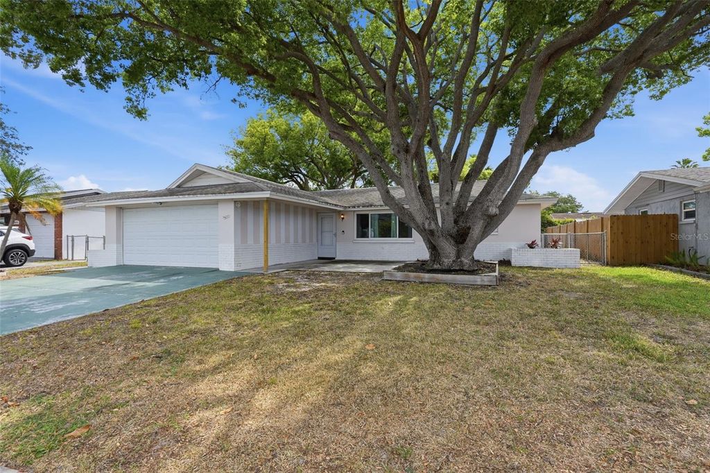 Photo of 9420 Glen Moor Lane, Port Richey, FL 34668 (MLS # TB8503182)