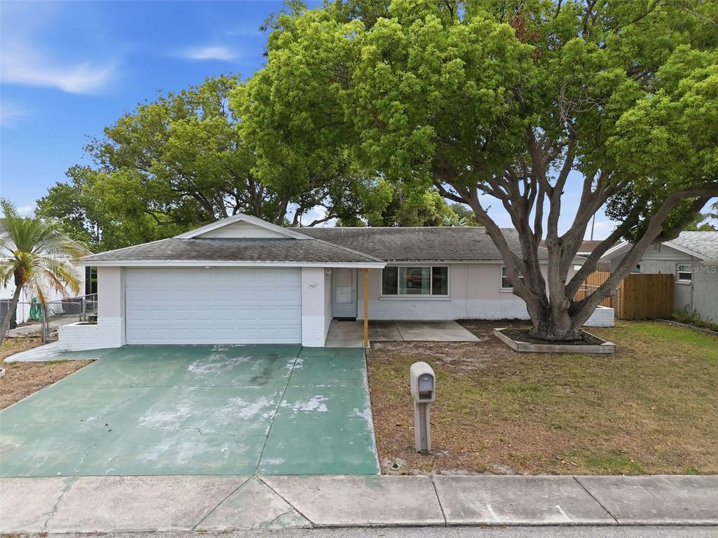 Photo of 9420 Glen Moor Lane, Port Richey, FL 34668 (MLS # TB8503182)