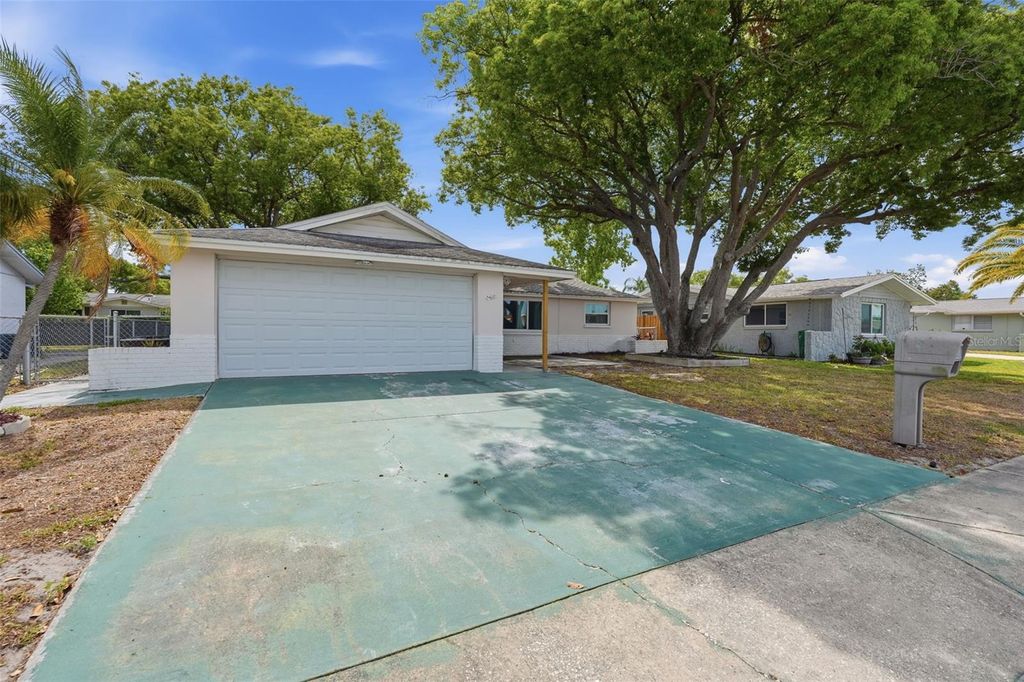 Photo of 9420 Glen Moor Lane, Port Richey, FL 34668 (MLS # TB8503182)