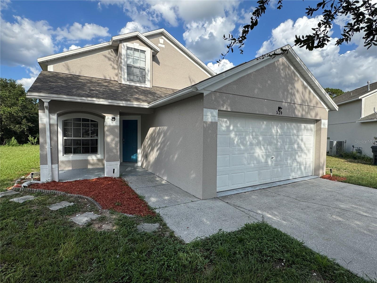 APPLY TODAY FOR FREE!! Beautiful 4 bedroom home available in Davenport! Welcome to your large two story home in this conveniently located gated community! House offers a large open kitchen and living room with a ton of natural light! Large backyard for relaxing after a long day! This on will go fast. Washer and Dryer included! Most pets welcome.