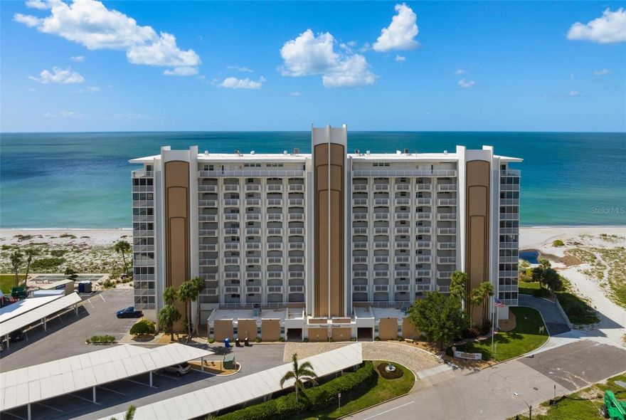 One or more photo(s) has been virtually staged. Direct Gulf frontage with private deeded beach access, and a short walk to historic Venice Island, its quaint shops, dining and recreational activities.  Impeccably maintained, freshly painted with ceramic tile flooring in all common living areas, new carpeting in both bedrooms. Wondrously unimpeded Gulf views from the living room and master bedroom. Impact resistant sliding glass doors from the living room and master bedroom were recently installed, providing direct access and exceptional views, and an especially large lanai overlooking the Gulf of Mexico. HVAC 2 years old. Secured lobby entry to elevator, features include heated pool and meeting/recreational center.