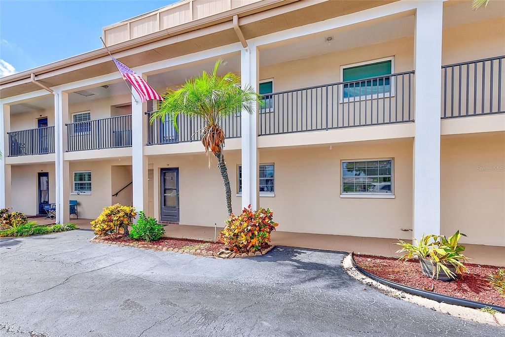 Photo of 10280 Imperial Point Drive W #7, Largo, FL 33774 (MLS # TB8446765)