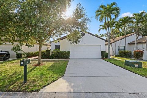 Photo of 61 Ironwood Way N, Palm Beach Gardens, FL 33418 (MLS # O6369004)