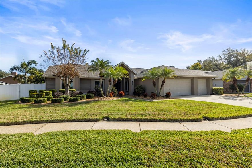 Welcome to this stunning and meticulously maintained 3-bedroom + office, 2-bath, 3-car garage, 2,502 sq ft pool home offering simple elegance, thoughtful upgrades, and a beautifully flowing split floor plan. Architecturally distinct design elements, subtle angles, and carefully considered lines create a warm, cohesive, and visually interesting flow throughout the home. Pride of ownership is evident in every space.

The kitchen, family room, and outdoor areas flow together seamlessly, creating an inviting and functional main living space ideal for everyday living and effortless entertaining. The family room features vaulted ceilings and abundant natural light. The kitchen is thoughtfully designed with custom cabinetry, a built-in refrigerator, quartz countertops, a large center island with excellent storage, a 2025 dishwasher and range and a dedicated built-in coffee nook.

The spacious primary suite offers a peaceful retreat with a large walk-in closet featuring custom built-ins and a spa-like bathroom that includes a freestanding tub, frameless glass walk-in shower, custom cabinetry, and a dedicated makeup area. Two additional bedrooms are complemented by a second bathroom. The office also includes custom built-in cabinetry, making it an ideal workspace or flexible-use room.

Step outside to a private backyard oasis featuring a sparkling saltwater Pebble Tec pool, a resurfaced deck with travertine pavers, lush professional landscaping, and a fully fenced yard designed for privacy and year-round enjoyment.

Recent upgrades and improvements include a brand-new roof (2025), brand-new water heater (2025), chimney cap replacement (2025), impact windows and sliding glass doors (2020), and an impact-rated front door (2024). Additional features include a generator-ready 30-amp inlet with an 8-breaker subpanel for select circuits, a whole-house water softener and filtration system, and an irrigation system that operates on well water. The home also includes in-ceiling speakers in the family room, a Martin Logan subwoofer, Polk Audio outdoor speakers on the patio, plantation shutters throughout, and an impressive elevation of approximately 75 feet above sea level, offering added peace of mind during storm season.

Located in the highly desirable Trails of Countryside, this non-evacuation zone community offers low HOA fees, no CDD, and a one-way-in, one-way-out neighborhood design that provides quiet streets, limited traffic, and a strong sense of community. The neighborhood is well known locally for its excellent trick-or-treating and walkability. Conveniently located near shopping, dining, parks, the Dunedin Causeway, Honeymoon Island, and vibrant Downtown Dunedin.

Impeccably cared for and thoughtfully updated, this home presents a rare opportunity to enjoy quality, comfort, and timeless design in one of Clearwater’s most sought-after neighborhoods.