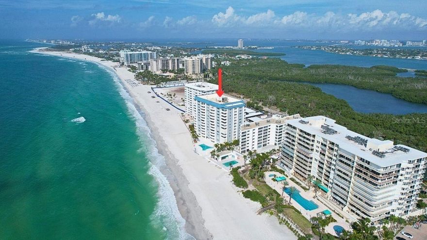 Gulf-Front Lido Key Rental — Available December 15, 2025 through June 2026 (30-day minimum stay). Seasonal Lease $9,400/mo. Off Season Lease $7,000/mo. Wake up to the sound of waves and end each day with a show-stopping Lido Key Beach sunset — this ninth-floor beachfront condo delivers front-row Gulf views that never get old. Located in the distinguished Key Towers South on Lido Key, this fully furnished retreat places the beach at your doorstep and luxury at your fingertips. Designed for comfort and ease, the open-concept layout flows effortlessly throughout the home. The kitchen features granite counters, stainless steel appliances, and a built-in desk space perfect for quick morning tasks or cocktail-recipe Googling. A dedicated office/den offers the ideal setup for remote work — because if you must email, at least do it from paradise. The real showpiece? The enclosed Gulf-front balcony — a breezy, bright extension of your living space where the shoreline becomes your daily backdrop. Coffee tastes better here. So do sunsets. The primary suite provides a serene coastal hideaway with ample closets and a private bath. A separate guest suite ensures your favorite company can enjoy comfortably. Additional conveniences include: Impact-rated windows throughout, Multiple storage closets, Access to a shared utility room with washers & dryers on the same floor and a dedicated storage locker. Residents of Key Towers South enjoy recently updated amenities, including: 
Refreshed lobby and first-floor social spaces (renovated 2025), Fitness room, library, and social room with catering kitchen, Sauna & shower facilities, Bike storage ,Gulf-front pool and lounge deck with spectacular sunsets. Perfectly positioned between the Gulf of Mexico and Sarasota Bay, this condo places you in the heart of Lido Key’s coastal playground. Stroll to the beach — it’s literally your backyard — or explore: South Lido Park just a quarter mile away. St. Armand's Circle one mile north — boutiques, dining, nightlife. Downtown Sarasota only four miles over the Ringling Bridge. Prefer not to drive? Hop on the free Sarasota Bay Runner trolley with convenient stops from south Lido to downtown Sarasota.