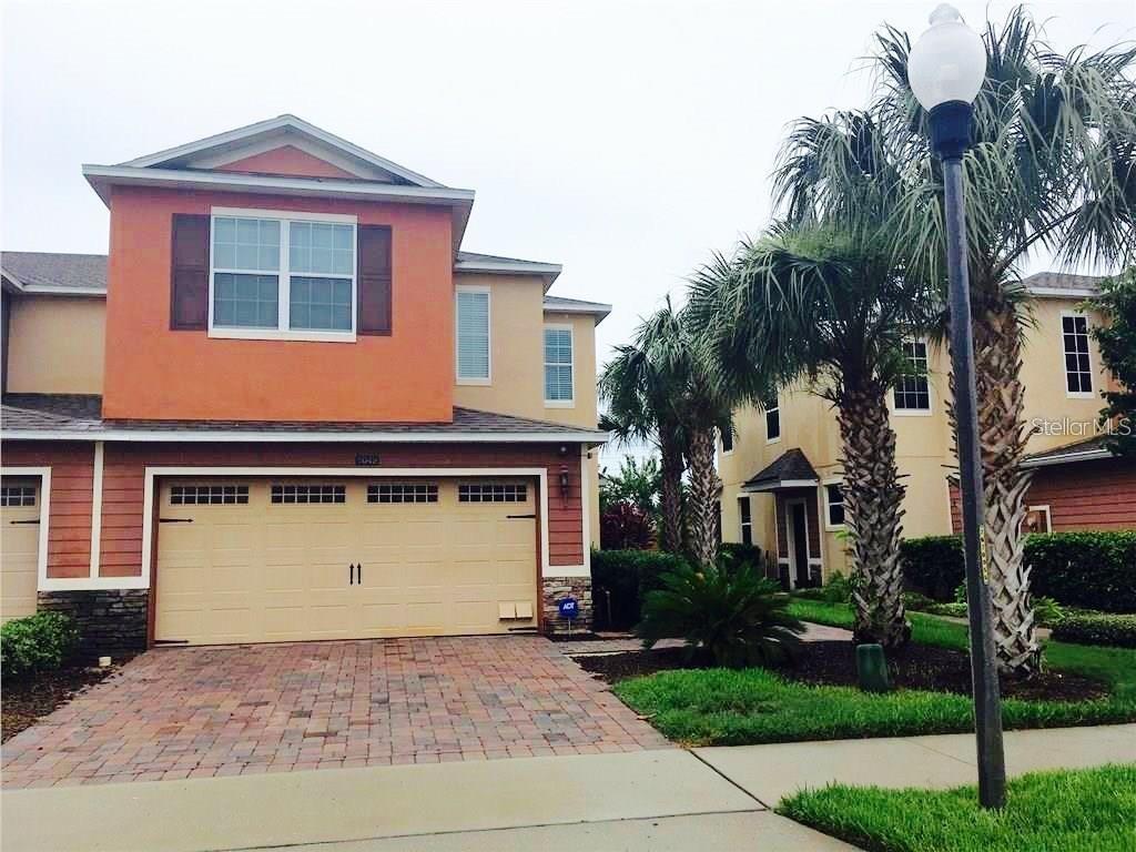 This stunning corner townhome boasts over 2,000 square feet of living space under central A/C and is located in the highly sought-after community of Westbrook at Stoneybrook West. Surrounded by beautifully maintained landscaping, the home welcomes you with a spacious Florida Room featuring carpet, blinds, and a convenient storage area. Inside, you’ll find elegant laminate wood flooring throughout the living and dining areas, along with a modern kitchen outfitted with granite countertops, 36” wood cabinetry, a stylish tile backsplash, and a full suite of stainless steel appliances—including refrigerator, range, and dishwasher. The generously sized master bedroom offers two walk-in closets, while the laundry room is conveniently located on the second floor. Enjoy the ease of walking access to nearby shopping and dining, with quick connectivity to major highways including Route 50, FL-429, FL-408, and Florida’s Turnpike. Just minutes from Winter Garden Village, local hospitals, and the charming Downtown Winter Garden district. This is a smoke-free, pet-free home. Don’t miss the opportunity—schedule your private tour today! No carpet at all!!!!