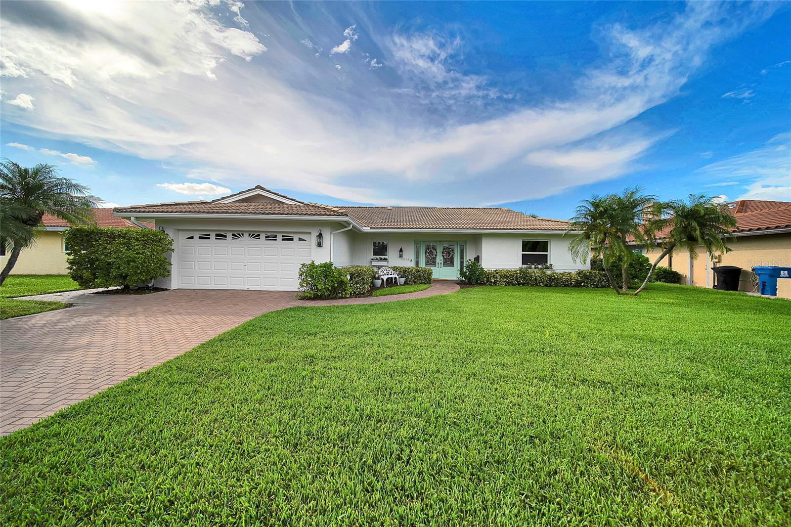 Fully Renovated Waterfront Pool Home in Highly Desirable Venetian Isles. Welcome to this beautifully renovated 3-bedroom, 2-bathroom home located in the sought-after waterfront community of Venetian Isles. Boasting two generously sized bedrooms with private en-suite bathrooms, this home offers both comfort and functionality for everyday living or entertaining. Renovated from top to bottom in 2025, no detail has been overlooked—new cabinetry, flooring, finishes, and fixtures give the entire home a fresh, modern feel. Step outside and enjoy your saltwater pool, surrounded by a spacious backyard perfect for lounging or hosting. For boating enthusiasts, this property includes a private boat lift with direct access to open water and no bridges, making sunset cruises and weekend adventures effortlessly accessible. Unwind in your backyard oasis as the sun sets over the water, creating a peaceful, picture-perfect end to your day. This is the ultimate opportunity to own a move-in-ready waterfront retreat.. Located in one of St. Pete’s most desirable neighborhoods, this home is currently zoned for Shorecrest Elementary School and Northeast High School, offering excellent options for families.