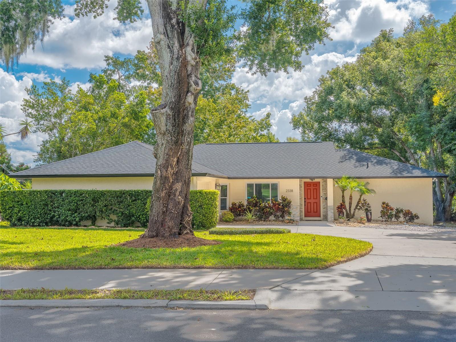 With over $60k in upgrades, this beautiful 4-bedroom, 2-bathroom lakeside retreat is tucked away in the highly sought-after Dommerich Hills community! Enjoy living next to the tranquil waters of Lake Waumpi and a peaceful conservation area, offering a rare blend of natural beauty and everyday comfort.
Surrounded by mature trees and set on over a 1-acre lot, the backyard is a true sanctuary, offering a fire-pit, ample space for entertaining, gardening, or even adding a pool to create your dream oasis. Step inside to find a perfect mix of timeless charm and modern upgrades. Elegant engineered hardwood and porcelain tile flooring flow throughout the home, while energy-efficient double-paned Low-E windows and doors enhance both comfort and style.
The kitchen is a chef’s delight, featuring granite countertops, stainless steel appliances, and a reverse osmosis system for crisp, clean drinking water. A spacious office adds flexibility—ideal for working from home, hosting guests, or creating a second cozy living area.
Recent improvements include a NEW ROOF (2022), NEW AC unit (2021), and a screened-in porch added in 2019, all make this the perfect spot to relax and take in the serene views. Located in the top-rated Winter Park School District and recently converted to city sewer, this move-in-ready home checks every box!
Come experience the peaceful charm and vibrant community of Dommerich Hills—schedule your private tour today!