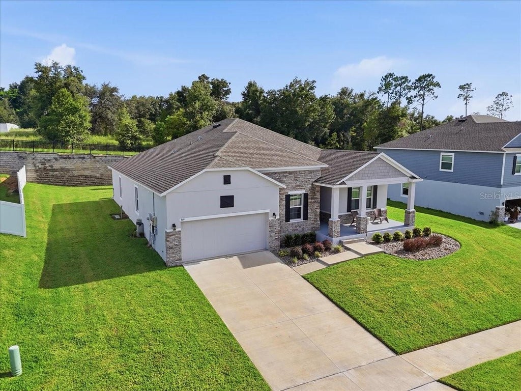 Photo of 949 Fieldstone Way, Haines City, FL 33844 (MLS # O6447768)