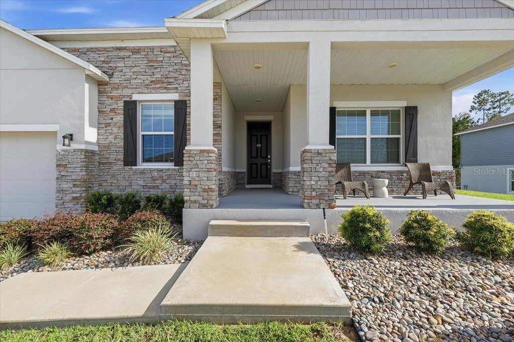 Photo of 949 Fieldstone Way, Haines City, FL 33844 (MLS # O6447768)