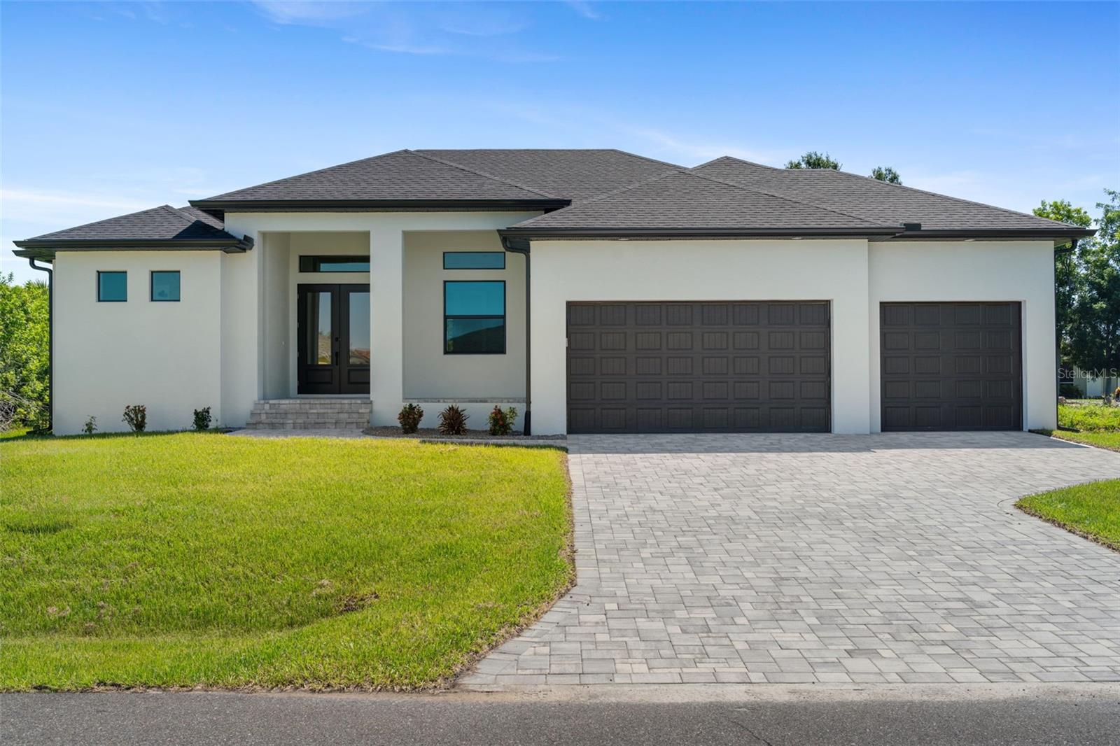 Step into this beautifully crafted, and newly constructed, 2025 Jordan Homes build inside the serene community of South Gulf Cove. Offering the perfect blend of modern elegance and Florida comfort, this thoughtfully designed 3-bedroom, 2-bathroom home features an extra den/office space and a beautiful pool package to boot. High ceilings, open concept, and a gourmet style kitchen completed with quartz counters, dual stacked, soft-close cabinets and drawers, and stainless steel appliances. Conveniently located near shopping, restaurants, spring training s