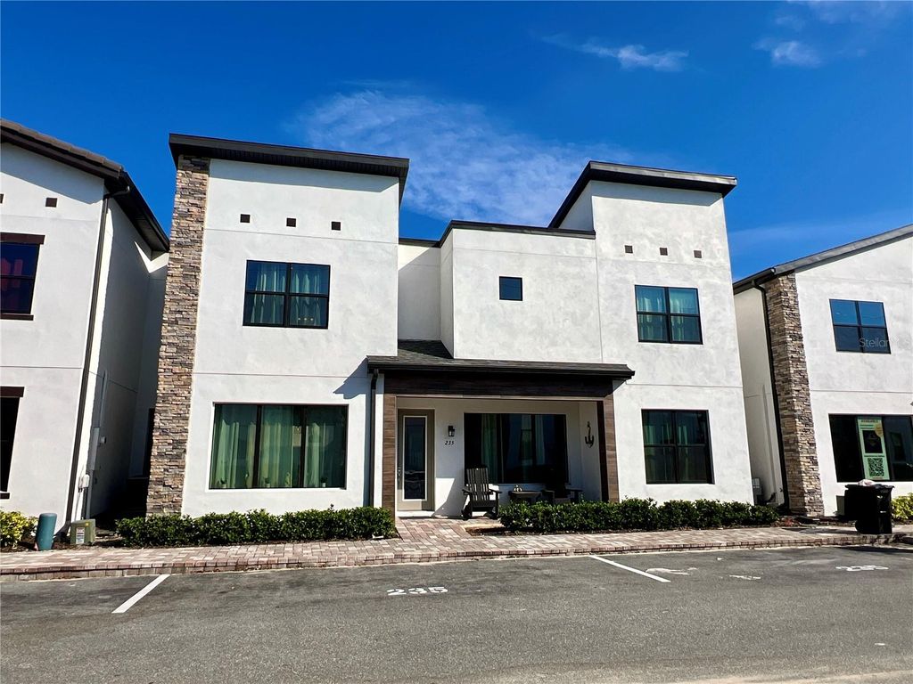 Photo of 235 Villa Domani Circle, Davenport, FL 33896 (MLS # O6361748)