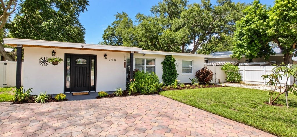 Photo of 12812 Lake Drive, Largo, FL 33774 (MLS # TB8540731)
