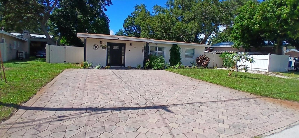 Photo of 12812 Lake Drive, Largo, FL 33774 (MLS # TB8540731)