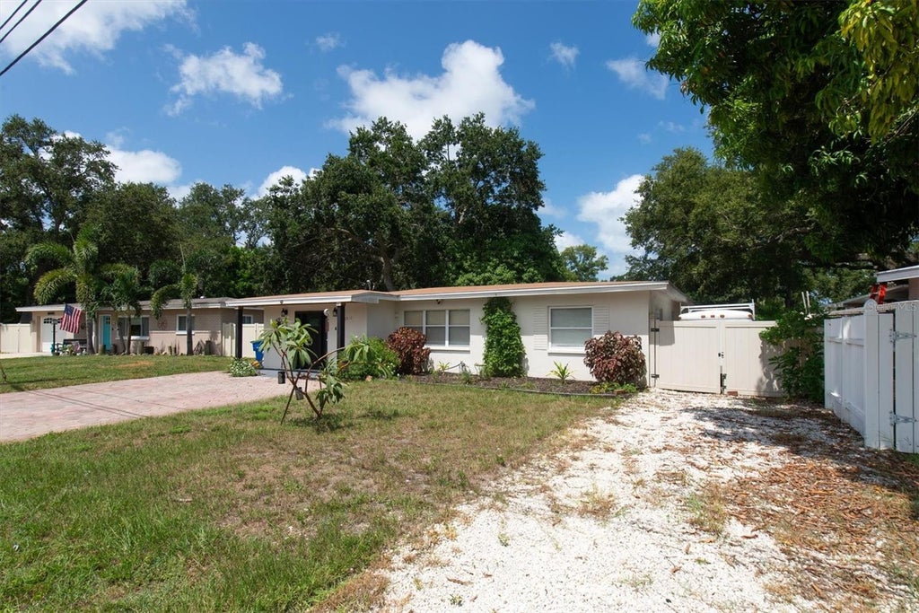 Photo of 12812 Lake Drive, Largo, FL 33774 (MLS # TB8540731)