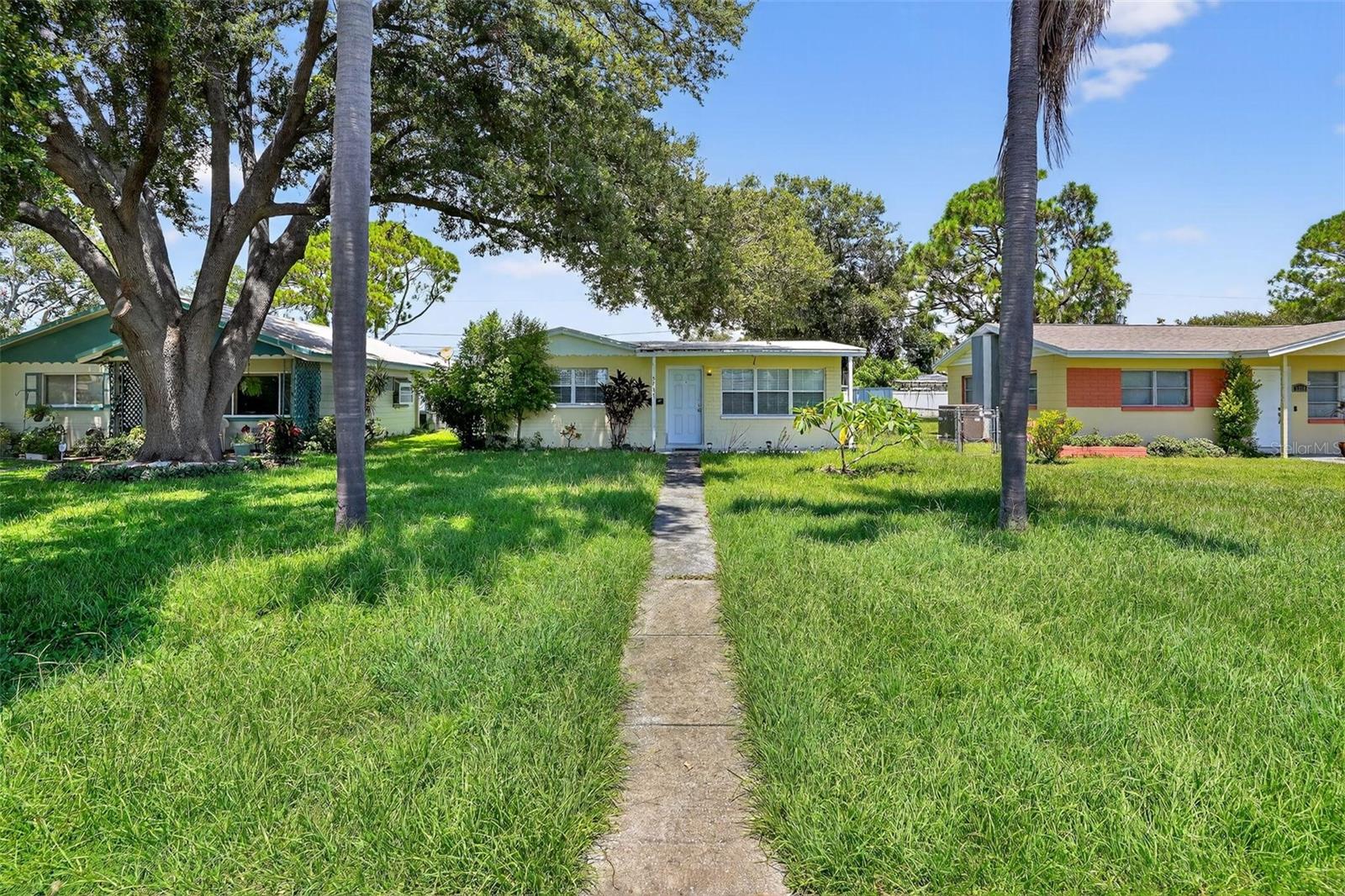 Charming 3-bedroom, 2-bathroom home located in the heart of Saint Petersburg. This property features an open floor plan with a spacious living area and a modern kitchen complete with stainless steel appliances and sleek countertops. The outdoor space has a lovely backyard, appropriate for entertaining or relaxing. Conveniently situated near shopping, dining, and parks, this home has the best of Florida living. The property also includes a one-car garage and ample storage space.