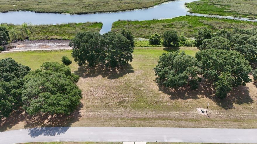 Beautiful canal front lot in Garden City. One of Groveland's premier neighborhoods in a magnificent location with pristine water views at almost every turn. This particular lot provides exclusive access to the Lower Clermont chain of lakes, including Lake Stuart, Lake Hunt, Lake Lucy, and Lake Emma. Bring your own builder and build the home of your dreams on this near one-acre piece of paradise. The minimum building requirement is 3800 square foot of living area (under air) with a tile or metal roof and a maximum of 1 story. With Mains Electricity and City Water available the community is approximately 27 miles from Orlando International Airport, 29 miles from Disney World and within close proximity of all major attractions. Florida's Turnpike and HWY 27 are minutes away. This vacant parcel offers ample space and privacy to create the perfect lakeside retreat and to custom build the home of your dreams. Seller is a Licensed Florida Real Estate Broker. Attractive Seller Financing Package Available.