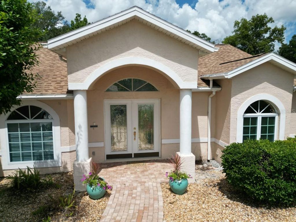Photo of 12125 Knotty Pine Loop, San Antonio, FL 33576 (MLS # TB8509654)